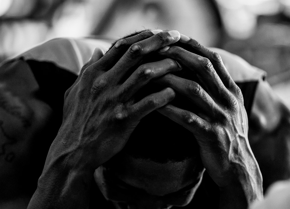 Anthony Joshua hands on head by sports photographer Stuart Manley