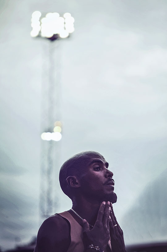 Mo Farah hands on his neck by sports photographer Stuart Manley